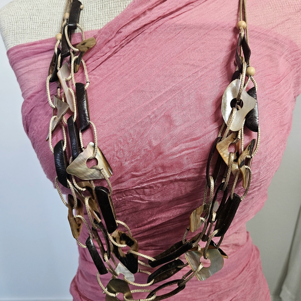 Multi Layered Shell, Leather And Cord Necklace In Brown And Cream Tones